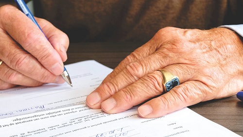 elderly man signing will capacity issues estate planning administration lawyers